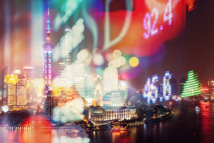 Double exposure of finance numbers and Shanghai Skyline