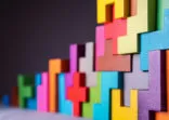Geometric shapes on a wooden background.