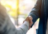 two people shaking hands