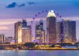 view Panoramic of the Singapore Skyline and Marina Bay, the marina is the centre of the economy in singapore, there are here all the building in singapore central