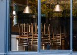 Window of an empty restaurant forced to close amid COVID-19 pandemic