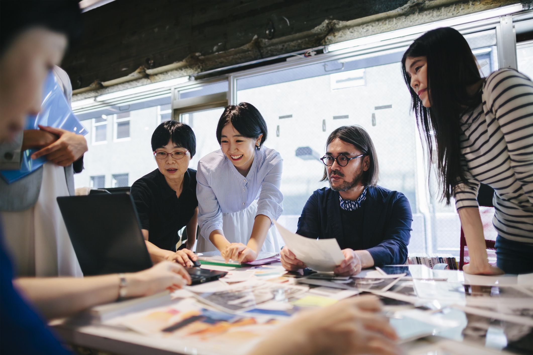 Women working together in modern working space