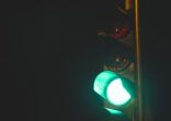 Close up traffic light with green light low angle view at night