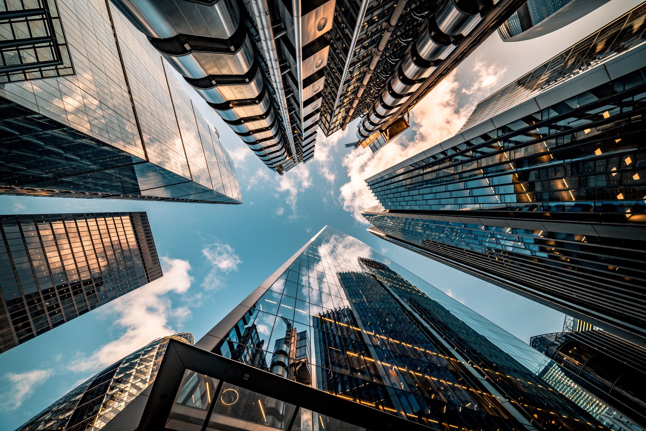 Looking directly up at the skyline of the financial district in central London – stock image