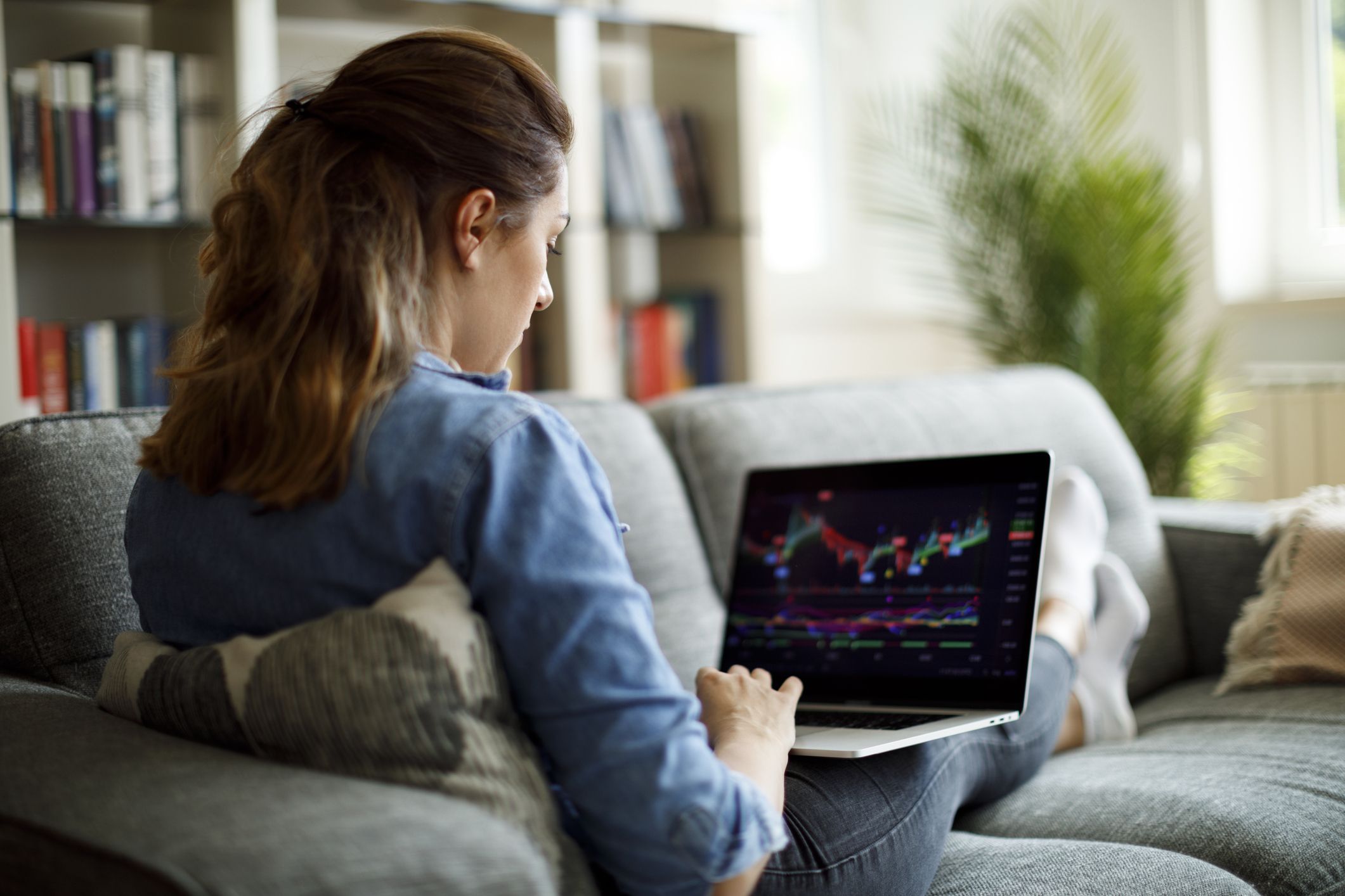 Young woman trading online