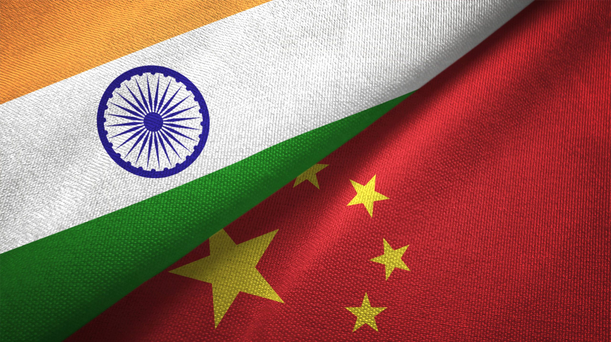 China and India two flags together textile cloth fabric texture