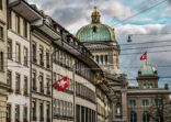 Apartments And Street View Of Swiss Parliament Building In Bern, Switzerland