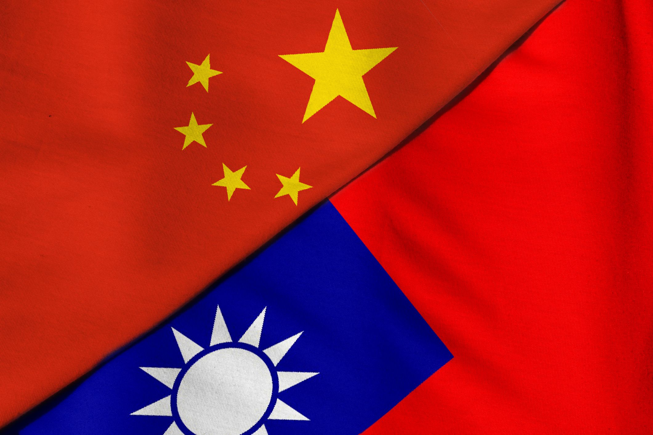 Two flags. People’s Republic of China and Taiwan.