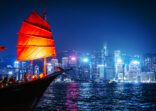 Hong Kong Night View with Traditional Junk Boat