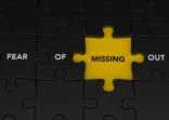 FOMO Fear of missing out word written on  3d puzzle pieces Top View Concept