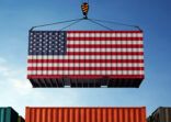 United States trade cargo container hanging against clouds background