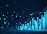 A blue digital bar graph with overlaid line graph, symbolizing growth on a dark blue bokeh background. Concept of analytics. 3D Rendering