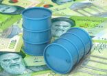 Iran war escalation prompts investor ‘panic’ as oil surges past $100 3d illustration: Blue barrels of oil lie on background of Iranian Rial banknotes, Islamic Republic of Iran. Petroleum business, black gold, gasoline production. Purchase sale, auction, stock exchange.